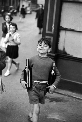 Henri Cartier-Bresson, Boy Carrying a Wine Bottle